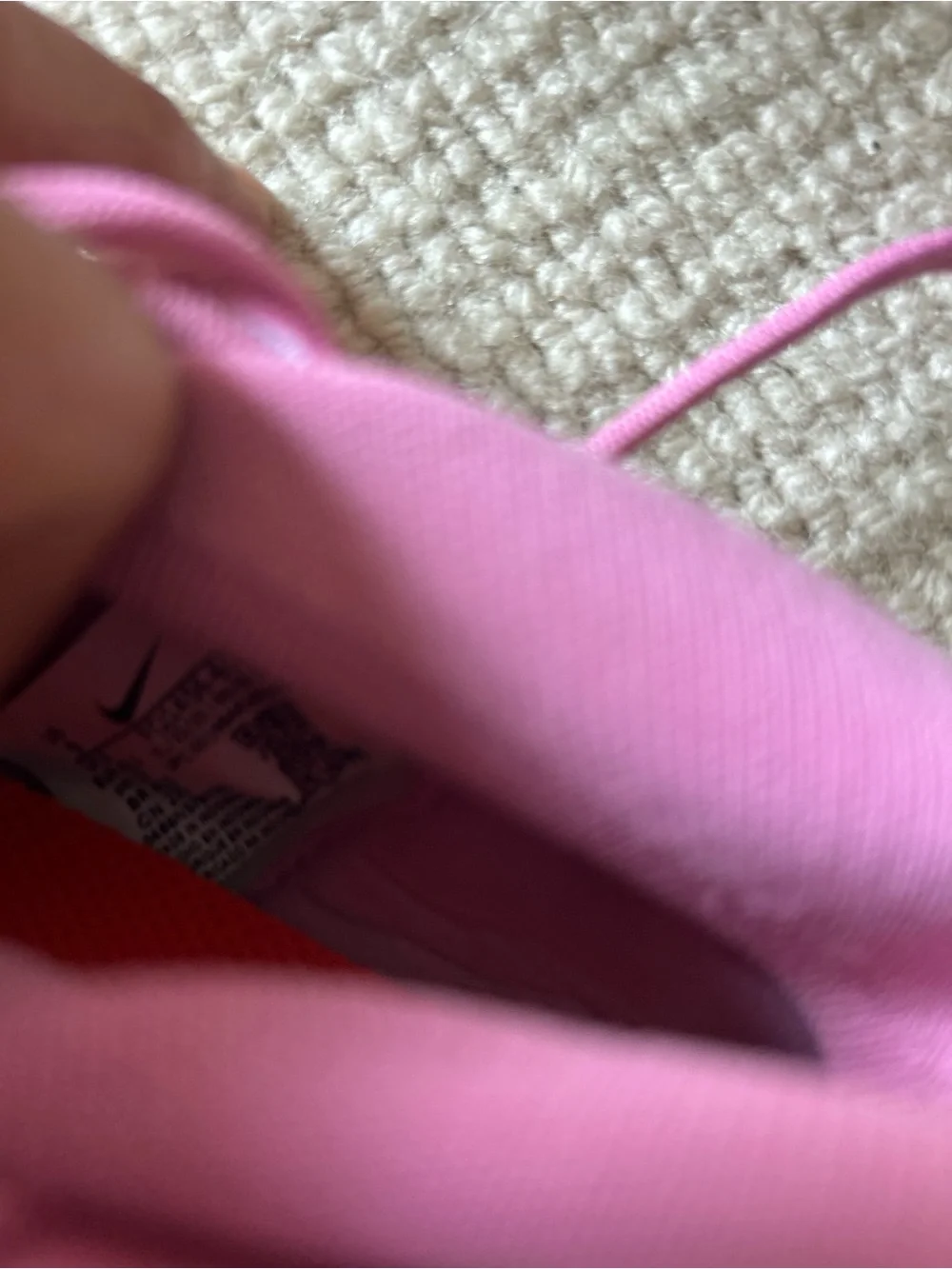 Nike Women’s Pink Sneakers with Orange Swoosh